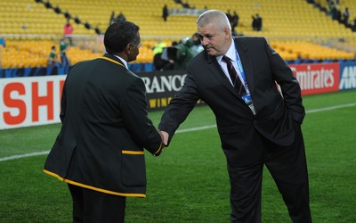 11.09.11 - South Africa v Wales - Rugby World Cup 2011 - South Africa head coach Peter de Villiers talks to Wales head coach Warren Gatland at the end of the game. 