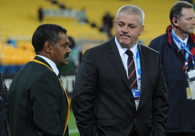 11.09.11 - South Africa v Wales - Rugby World Cup 2011 - South Africa head coach Peter de Villiers talks to Wales head coach Warren Gatland at the end of the game. 