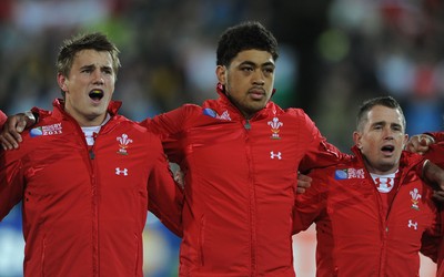 11.09.11 - South Africa v Wales - Rugby World Cup 2011 - Jonathan Davies, Toby Faletau and Shane Williams of Wales during the national anthems. 