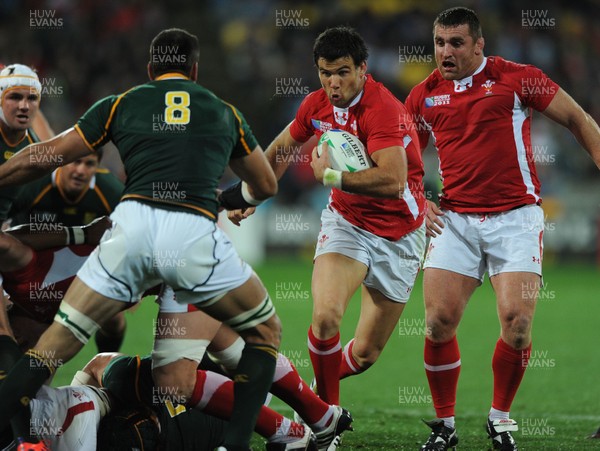 11.09.11 - South Africa v Wales - Rugby World Cup 2011 - Mike Phillips of Wales takes on Pierre Spies of South Africa. 