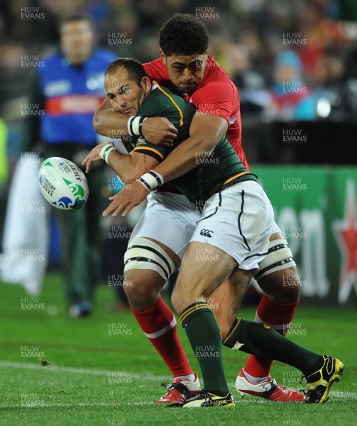 11.09.11 - South Africa v Wales - Rugby World Cup 2011 - Fourie du Preez of South Africa is tackled by Toby Faletau of Wales. 
