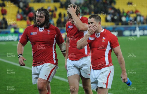 11.09.11 - South Africa v Wales - Rugby World Cup 2011 - Adam Jones, Rhys Priestland and Shane Williams of Wales look dejected. 