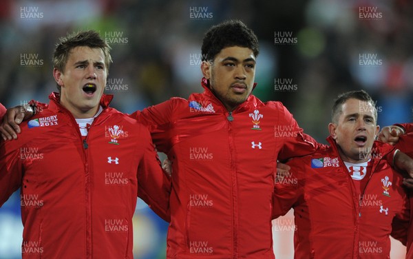 11.09.11 - South Africa v Wales - Rugby World Cup 2011 - Jonathan Davies, Toby Faletau and Shane Williams of Wales during the national anthems. 