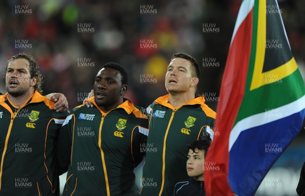 11.09.11 - South Africa v Wales - Rugby World Cup 2011 - John Smit (right) of South Africa during the national anthems. 