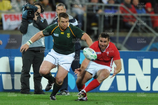 11.09.11 - South Africa v Wales - Rugby World Cup 2011 - Huw Bennett of Wales and John Smit of South Africa. 
