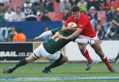14.06.08 South Africa v Wales (Second Test)... Wales'  Jamie Roberts is tackled by South Africa's Peter Grant. 