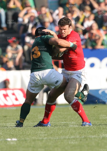 14.06.08 South Africa v Wales (Second Test)... Wales' Jamie Roberts takes on South Africa's Adrian Jacobs.  