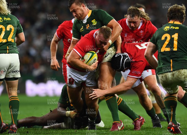 160722 - South Africa v Wales - Castle Lager Incoming Series 2022 Third Test - Dewi Lake of Wales is tackled by Handre Pollard of South Africa