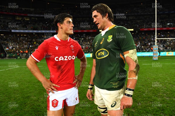 160722 - South Africa v Wales - Castle Lager Incoming Series 2022 Third Test - Louis Rees-Zammit and Franco Mostert of South Africa at the end of the game