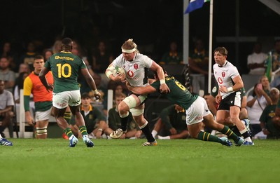 180726 - South Africa v Wales - Nations Championship - Aaron Wainwright of Wales is tackled by Paul de Villiers of South Africa 