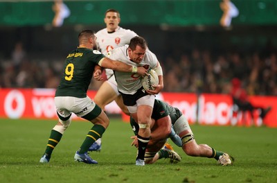 180726 - South Africa v Wales - Nations Championship - Ryan Elias of Wales is tackled by Cobus Reinach of South Africa 