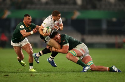 180726 - South Africa v Wales - Nations Championship - Joe Hawkins of Wales is tackled by Cobus Wiese of South Africa 