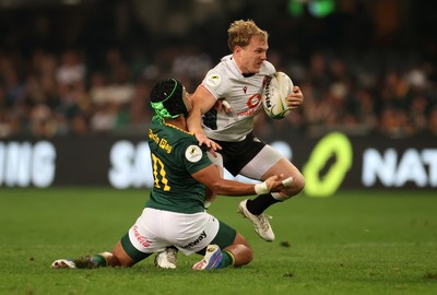 180726 - South Africa v Wales - Nations Championship - Blair Murray of Wales is tackled by Kurt-Lee Arendse of South Africa 