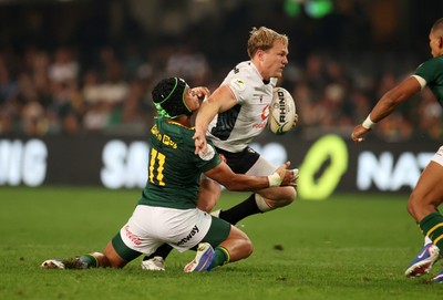 180726 - South Africa v Wales - Nations Championship - Blair Murray of Wales is tackled by Kurt-Lee Arendse of South Africa 
