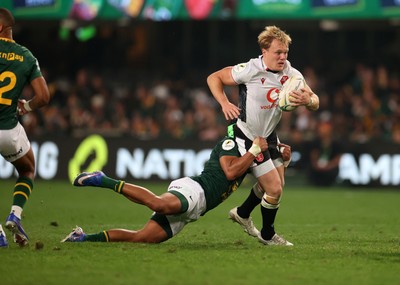 180726 - South Africa v Wales - Nations Championship - Blair Murray of Wales is tackled by Kurt-Lee Arendse of South Africa 