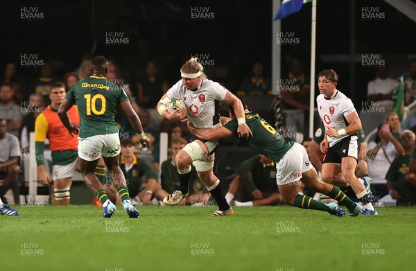 180726 - South Africa v Wales - Nations Championship - Aaron Wainwright of Wales is tackled by Paul de Villiers of South Africa 