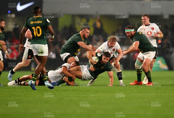 180726 - South Africa v Wales - Nations Championship - Paul de Villiers of South Africa is tackled by Alex Mann and Jac Morgan of Wales 
