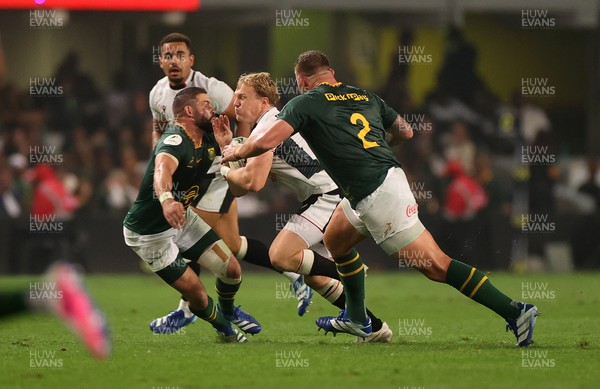 180726 - South Africa v Wales - Nations Championship - Blair Murray of Wales is tackled by Cobus Reinach of South Africa 