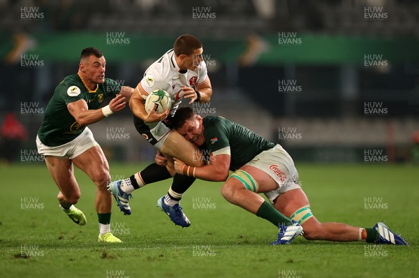 180726 - South Africa v Wales - Nations Championship - Joe Hawkins of Wales is tackled by Cobus Wiese of South Africa 