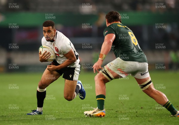 180726 - South Africa v Wales - Nations Championship - Ben Thomas of Wales is tackled by Jasper Wiese of South Africa 