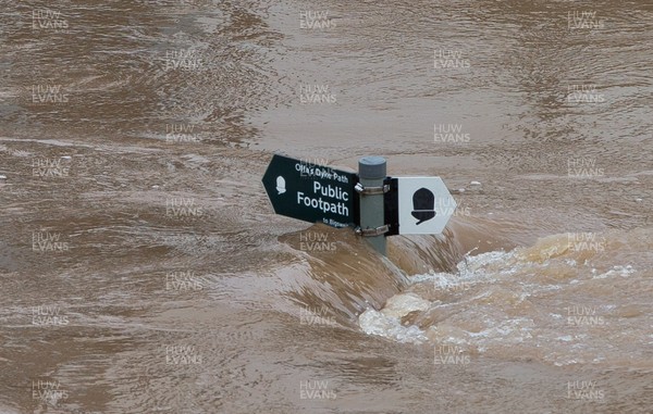 180220 - South Wales Flooding - A public footpath sign is virtually submerged at Brockweir in the Wye Valley south of Monmouth, as the river bursts it's banks in the aftermath of Storm Dennis