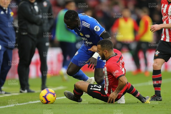 090219 - Southampton v Cardiff City, Premier League - Oumar Niasse of Cardiff City is tackled by Ryan Bertrand of Southampton