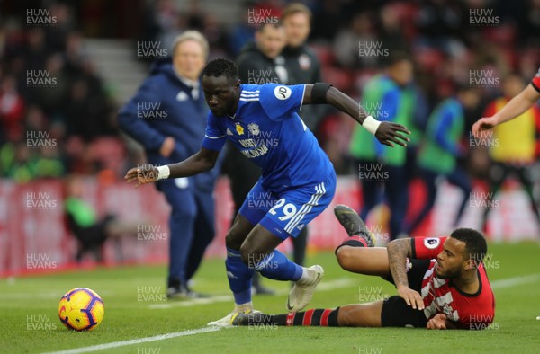 090219 - Southampton v Cardiff City, Premier League - Oumar Niasse of Cardiff City is tackled by Ryan Bertrand of Southampton