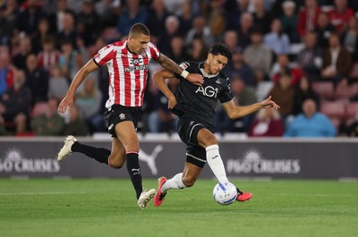 080926 - Southampton v Swansea City, EFL Sky Bet Championship - Marko Stamenic of Swansea City looks to shoot as Nathan Wood of Southampton closes in