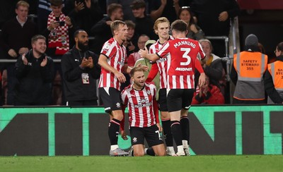 080926 - Southampton v Swansea City, EFL Sky Bet Championship - Leo Scienza of Southampton celebrates with team mates after he shoots to score the third goal