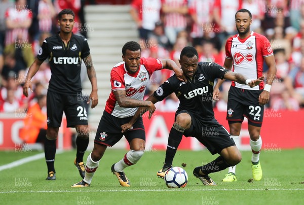 120817 - Southampton v Swansea City, Premier League - Jordan Ayew of Swansea City and Ryan Bertrand of Southampton compete for the ball