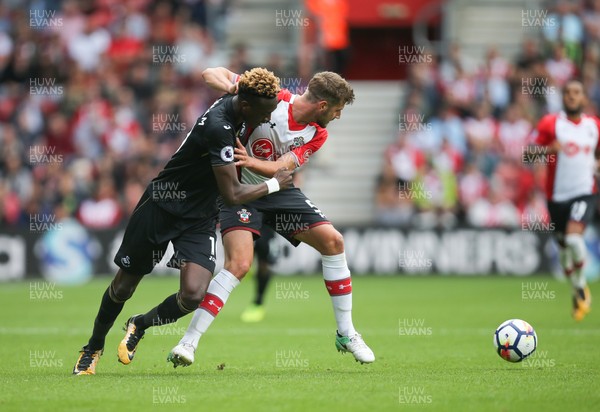 120817 - Southampton v Swansea City, Premier League - Tammy Abraham of Swansea City and Jack Stephens of Southampton compete for the ball