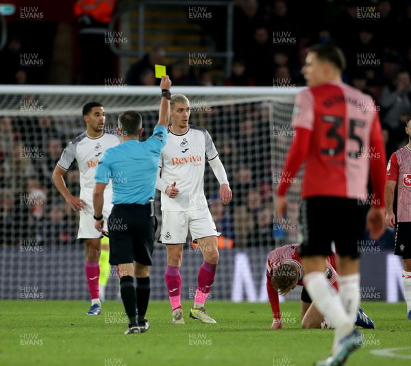 261223 - Southampton v Swansea City - Sky Bet Championship - Jay Fulton of Swansea City gets a yellow card from referee Keith Stroud