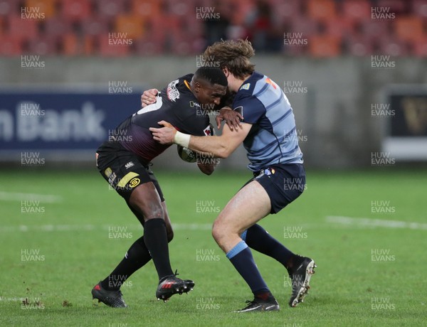 140418 - Southern Kings v Cardiff Blues - Guinness PRO14 - Blaine Scully of Cardiff Blues tackles Ntabeni Dukisa of Southern Kings