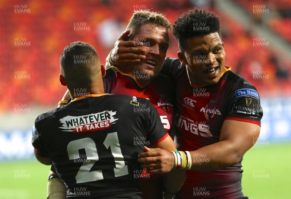020318 - Southern Kings v Dragons - Guinness PRO14 -  Teammates congratulate Ruaan Lerm of Southern Kings on his try