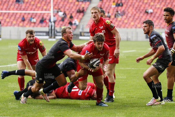 261117 - Southern Kings v Scarlets - Guinness PRO14 -   Daniel Jones of Scarlets is tackled by Rudi van Rooyen of the Southern Kings  (L) 