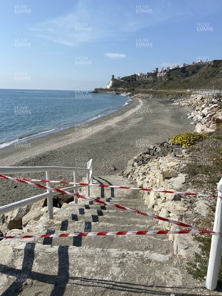 140320 - Coronavirus (Covid-19) in Spain -  Deserted beaches near Nerja, Malaga on the Costa del Sol which have been closed to the public 