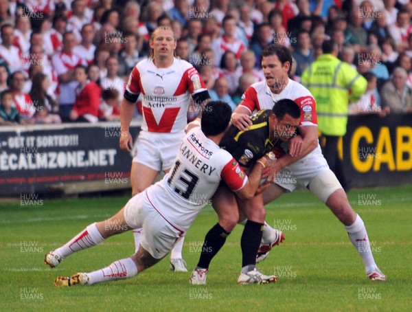 26.06.09 St Helens V Celtic Crusaders. Engage Super League Celtics  Lincoln Withers is halted by Saints Matt Gidley  in the Engage Super League game at the GWP Stadium. 