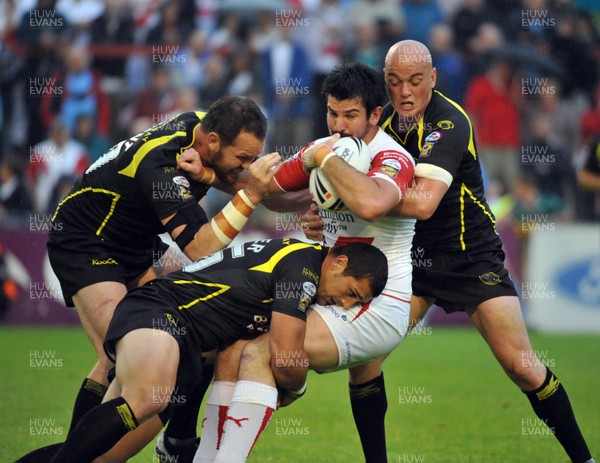 26.06.09 St Helens V Celtic Crusaders. Engage Super League Saints  Chris Flannery gets the  Celtic treatment   in the Engage Super League game at the GWP Stadium. 