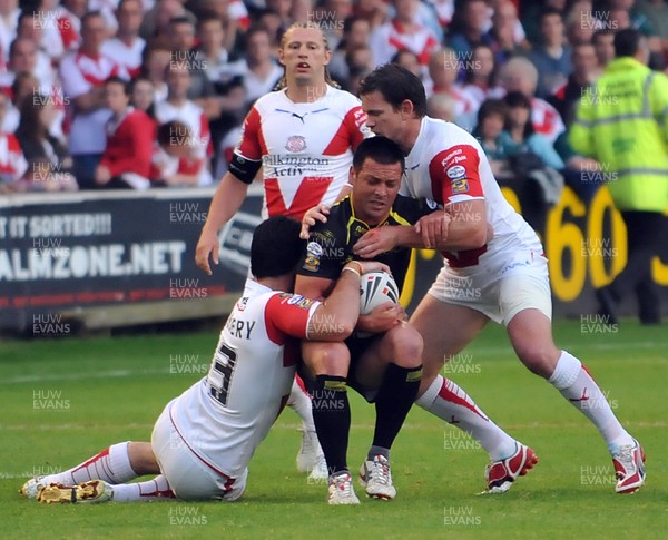 Saints Chris Flannery and Matt Gidley tackle Crusaders Lincoln Withers in the Engage Super League game at the GPW Stadium.