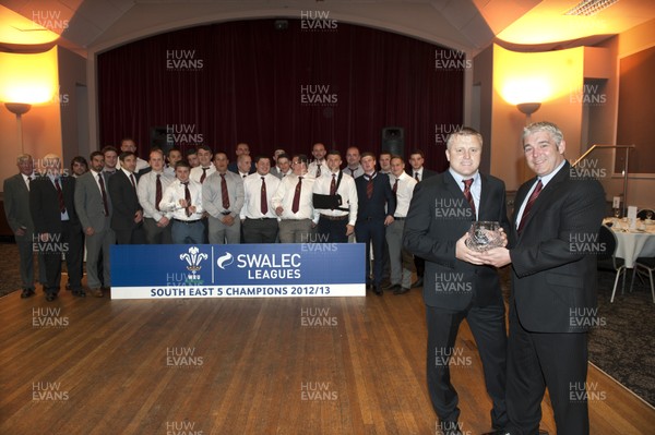 140613 - St Josephs RFC - South East 5 Champions -    St Josephs celebrate winning the SWALEC South East 5 League Pictured with the trophy are captain Jason Goodridge, left, and Club Secretary Martin Tumelty  