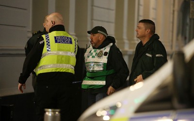 171218 - Picture shows police presence on St Mary's Street, Cardiff centred around the Sandringham Hotel (above Ladbrokes), where it is rumoured to be a hostage situation - 