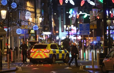 171218 - Picture shows police presence on St Mary's Street, Cardiff centred around the Sandringham Hotel (above Ladbrokes), where it is rumoured to be a hostage situation - 