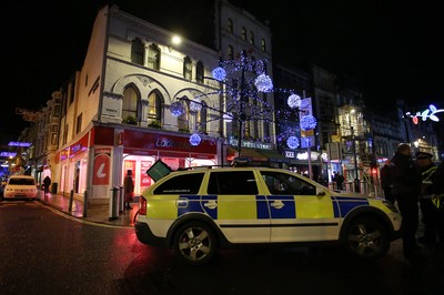 171218 - Picture shows police presence on St Mary's Street, Cardiff centred around the Sandringham Hotel (above Ladbrokes), where it is rumoured to be a hostage situation - 