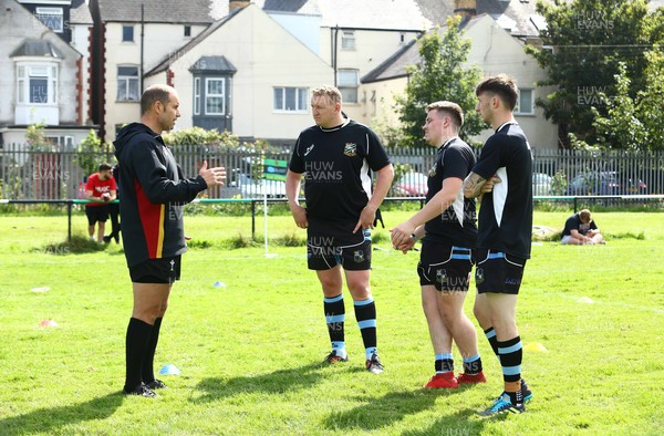 280821 - St Peters v Rumney - WRU National Plate -   Players of Rumney warm up before the game