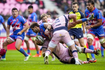 061225 - Stade Francais v Cardiff Rugby - EPCR Challenge Cup - Paul Abadie of Stade Francais is tackled by Evan Lloyd of Cardiff (2)