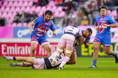 061225 - Stade Francais v Cardiff Rugby - EPCR Challenge Cup - Joe Marchant of Stade Francais is tackled by Steffan Emanuel of Cardiff and Taine Basham of Cardiff 