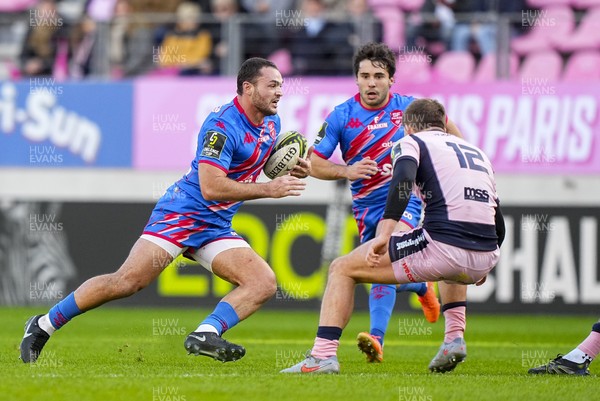 061225 - Stade Francais v Cardiff Rugby - EPCR Challenge Cup - Julien Delbouis of Stade Francais takes on Steffan Emanuel of Cardiff 