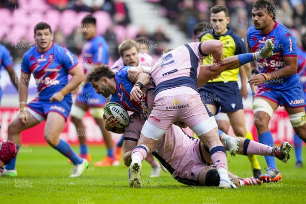 061225 - Stade Francais v Cardiff Rugby - EPCR Challenge Cup - Paul Abadie of Stade Francais is tackled by Evan Lloyd of Cardiff (2)