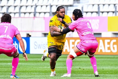 050426 - Stade Francais v Dragons RFC - EPCR Challenge Cup Round of 16 - Levi Douglas of Dragons takes on Pierre-Henri Azagoh of Stade Francais 