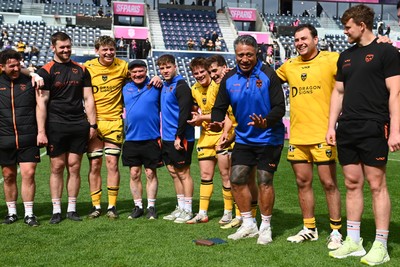 050426 - Stade Francais v Dragons RFC - EPCR Challenge Cup Round of 16 - Coach Filo Tiatia of Dragons RFC in the team huddle after the match